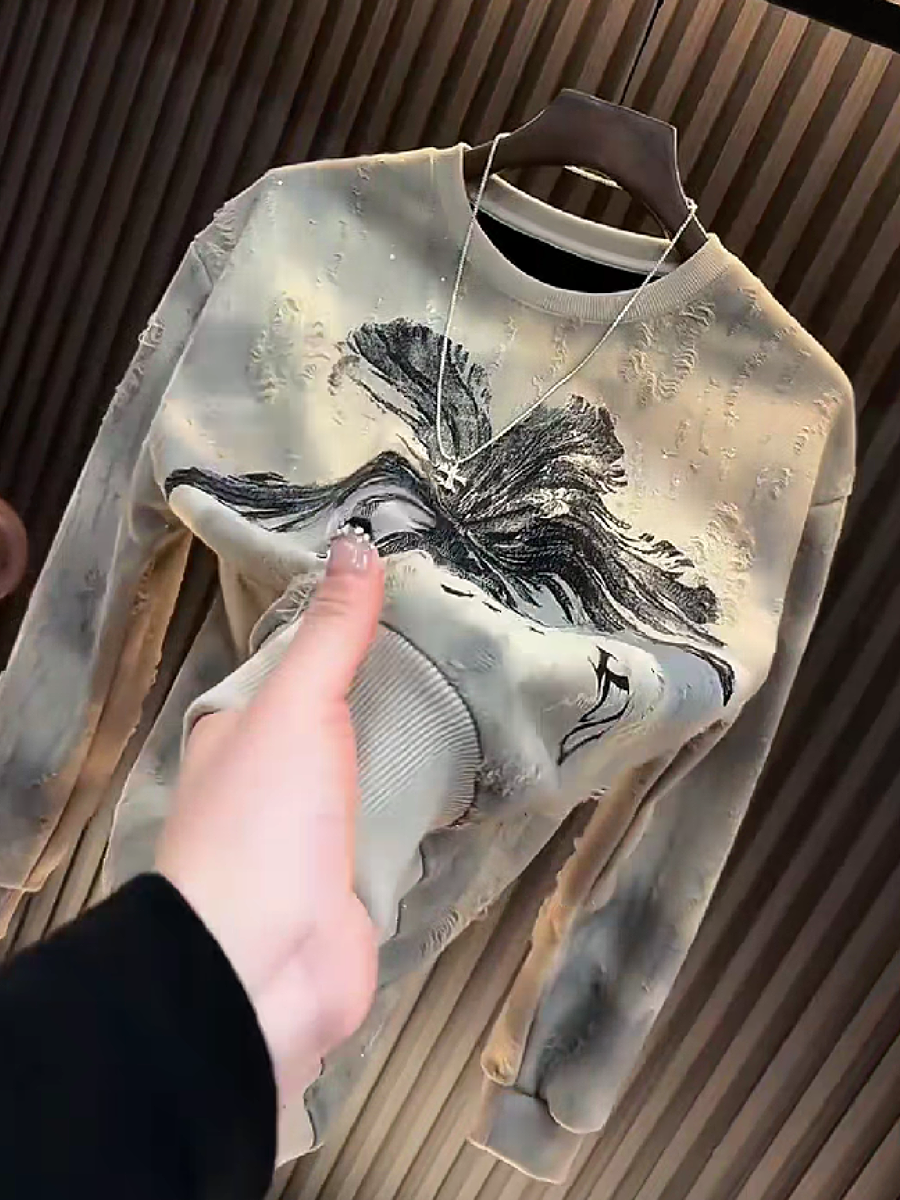 FeatherGlow Sweater